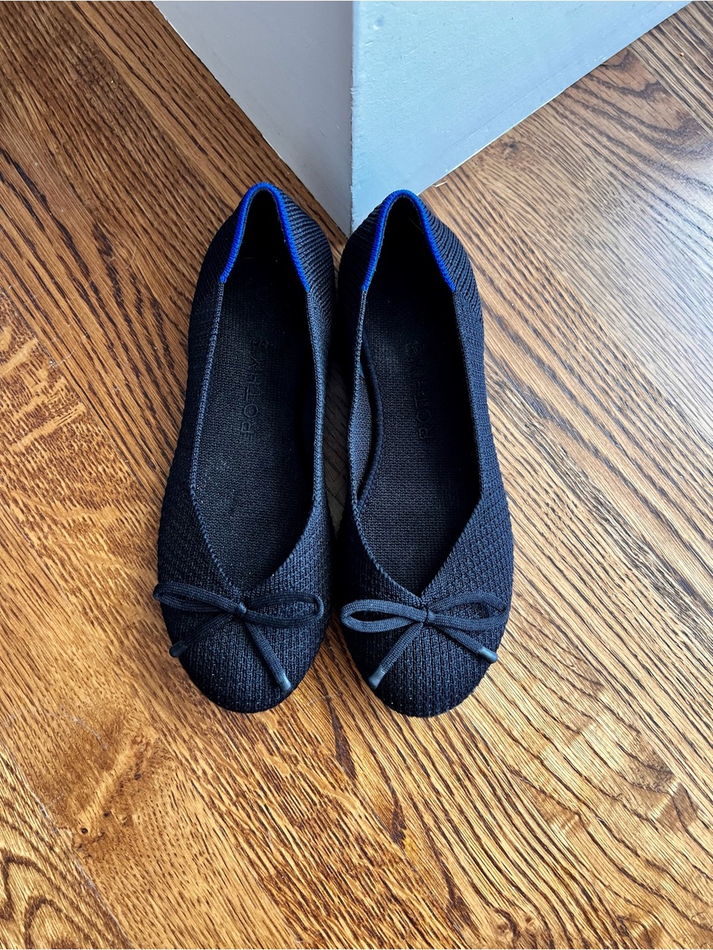 Rothy's Black Knit Ballet Flats with Blue Trim & Bow Tie Detail